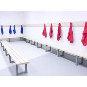 Five Blue Shirts and Five Red Shirts Hanging in Changing Room of Gym 