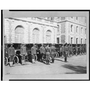  ,motor ambulance,men,front of building ready to start