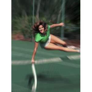  Woman Leaping over the Net on Tennis Court Stretched 