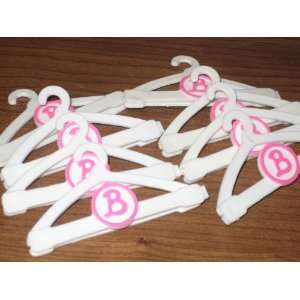  SET OF 8 BARBIE DOLL CLOTHES HANGERS 