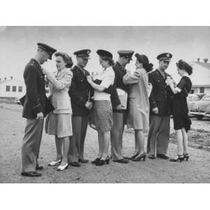  Women Pinning Wings Onto Four Air Force Cadets at Foster 