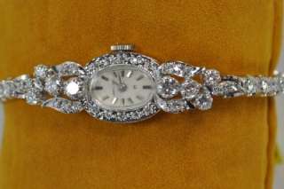   of 21.30 grams including watch movement, crystal and band. 3mw1258