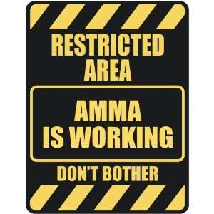   RESTRICTED AREA AMMA IS WORKING  PARKING SIGN