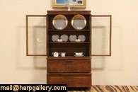   1930 s a bookcase china or curio cabinet has curved glass doors walnut
