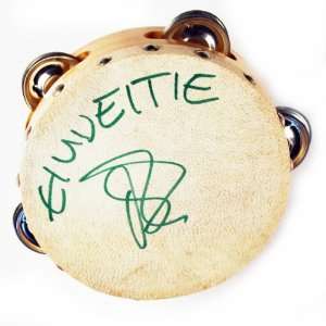   Band Autographed Tambourine by Singer Merlin Sutter 