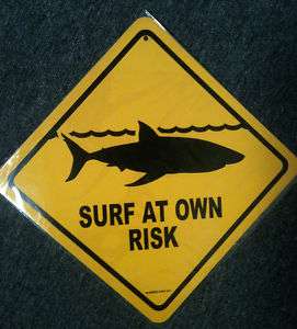 Surf at your own risk   Shark warning sign   danger  