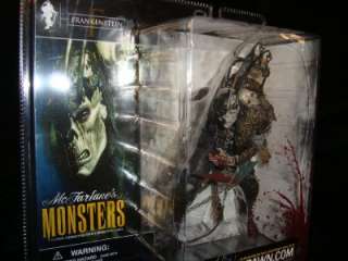 MCFARLANE MONSTERS FRANKENSTEIN CORPSE ON CAGE ON BACK BLOODY CHAINS 