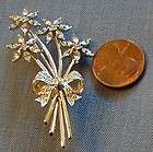 CIRO FOUR CRYSTAL FLORAL AND BOW PIN
