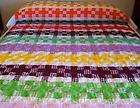 Quilt of many colors. Handmade, ready to love.  