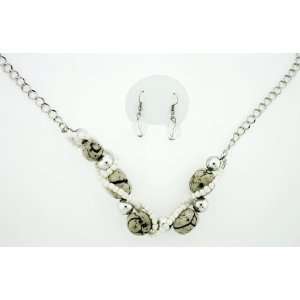 White Semi precious Rock Stones and Silver toned Beads with Line of 