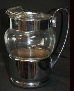 mid century modern chrome and glass handled pitcher  
