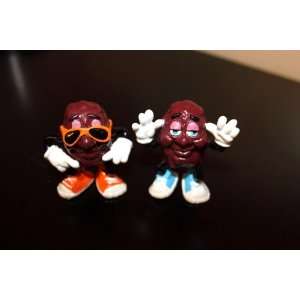  Two Funny Cool California Raisin Figures dated 1987 
