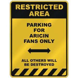  RESTRICTED AREA  PARKING FOR ARICIN FANS ONLY  PARKING 