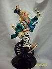 juggling clown on unicycle w metal stand euc returns not