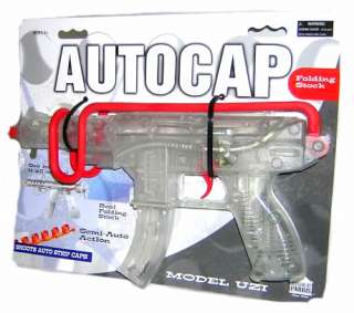 YOU ARE BUYING A BRAND NEW, ON CARD, MODEL UZI TOY CAP GUN WHICH 