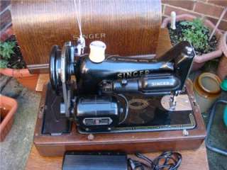   Vintage Old electric and hand crank Singer Sewing Machine model 99K