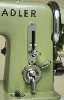  stitch control panel. Above, the tall vertical control is the stitch