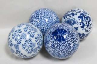 Four Decorative Blue and White Ceramic Balls  