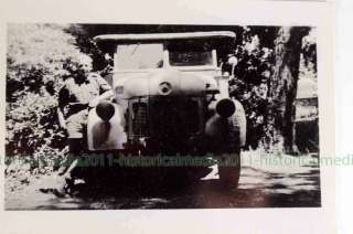 WWII Photo  TROOP + CAPTURED VEHICLE IN FIELD _99  