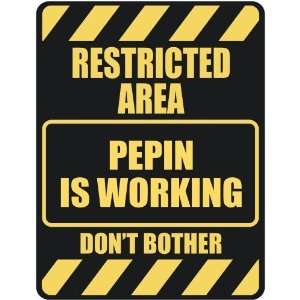   RESTRICTED AREA PEPIN IS WORKING  PARKING SIGN