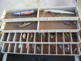   fishing tackle box full of lures and fishing tackle cork lined nice