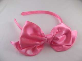Fab and funky Neon pink satin bow headband/aliceband  