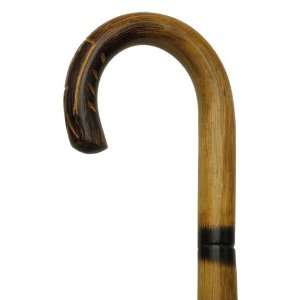 Walking Cane   Carved nose crook handle, 1 diameter rattan, four 