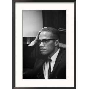  Malcolm X waits at Martin Luther King Press Conference 