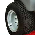 Large pneumatic drive tires provide increased traction and floatation 