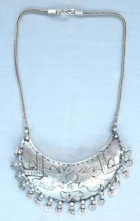 traditionally styled, handcrafted, silver necklace from India.