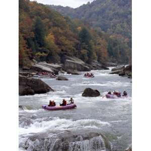  Rafters Riding the Rock Strewn Gauley River Through a 