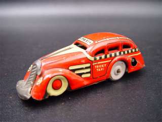 Marx Red Tricky Taxi Tin Windup Toy Table Top Car  