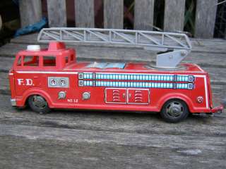 VINTAGE FIRE DEPARTMENT F.D. 12 FRICTION TIN TOY TRUCK  
