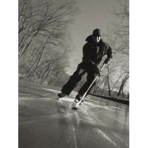  Ice Skater with a Hockey Stick on the Frozen C and O Canal 